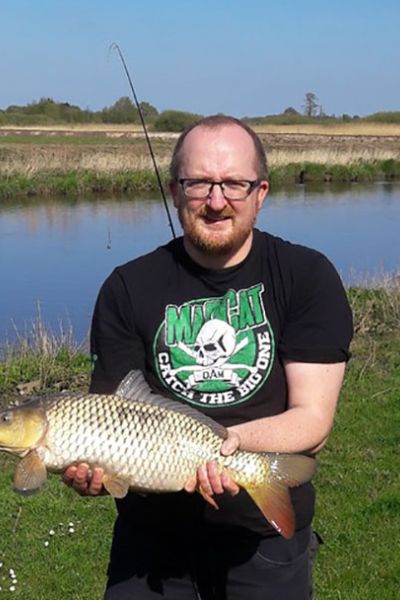 Andreas Pamp mit Karpfen