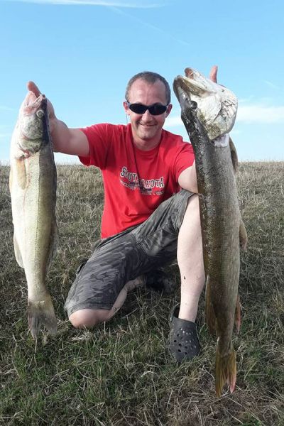 Holger Fröhlich mit Zander und Hecht